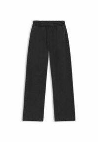 Pantalons larges noirs avec une taille élastique, texture douce et poches latérales. Design simpliste sans motifs ni éléments métalliques visibles.