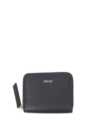 Leather wallet in black with textured finish, zip closure, and gold-tone logo. Features a small tag on one side. Compact rectangular shape.