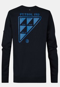 Sudadera negra de mangas largas, que presenta un logo geométrico azul con el texto "PETROL IND" y iconos dentro de un patrón de triángulos.