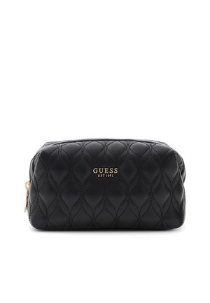 Pochette Guess matelassée noire avec fermeture éclair dorée et logo "GUESS EST 1981" en lettres dorées sur le devant, présentée sur fond blanc.