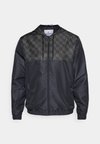 INTRICO TRACK JACKET - Chaqueta de entrenamiento - black/grape leaf