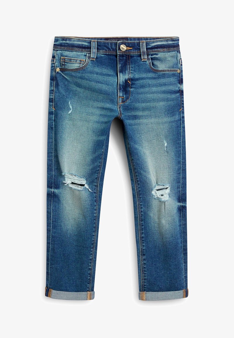 Jeans en denim bleu avec revers retroussés et déchirures usées sur les deux genoux, dotés de poches avant et arrière ainsi que de rivets en cuivre.