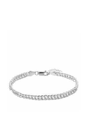 Bracelet chaîne en argent fin avec fermoir mousqueton, présenté en forme circulaire sur fond blanc uni.