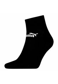 Schwarze Knöcheslsocke aus glattem Material, mit einem weißen Puma-Logo an der Seite. Einfaches Design ohne zusätzliche Muster oder Akzente.