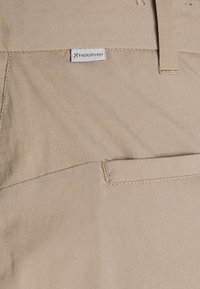 Houdini WADI PANTS - Āra bikses - beige