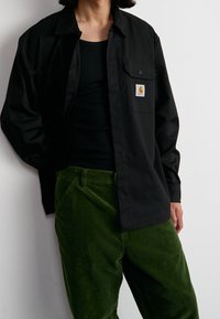 Carhartt WIP Kalhoty - olive