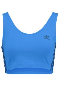 Blå crop top i slät tyg, med rundad halsringning och Adidas-logotyp, samt svarta sidostråk längs kanterna.