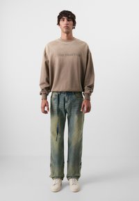 Don't Waste Culture ZIGA UNISEX - Calças de ganga folgadas - ocean sand