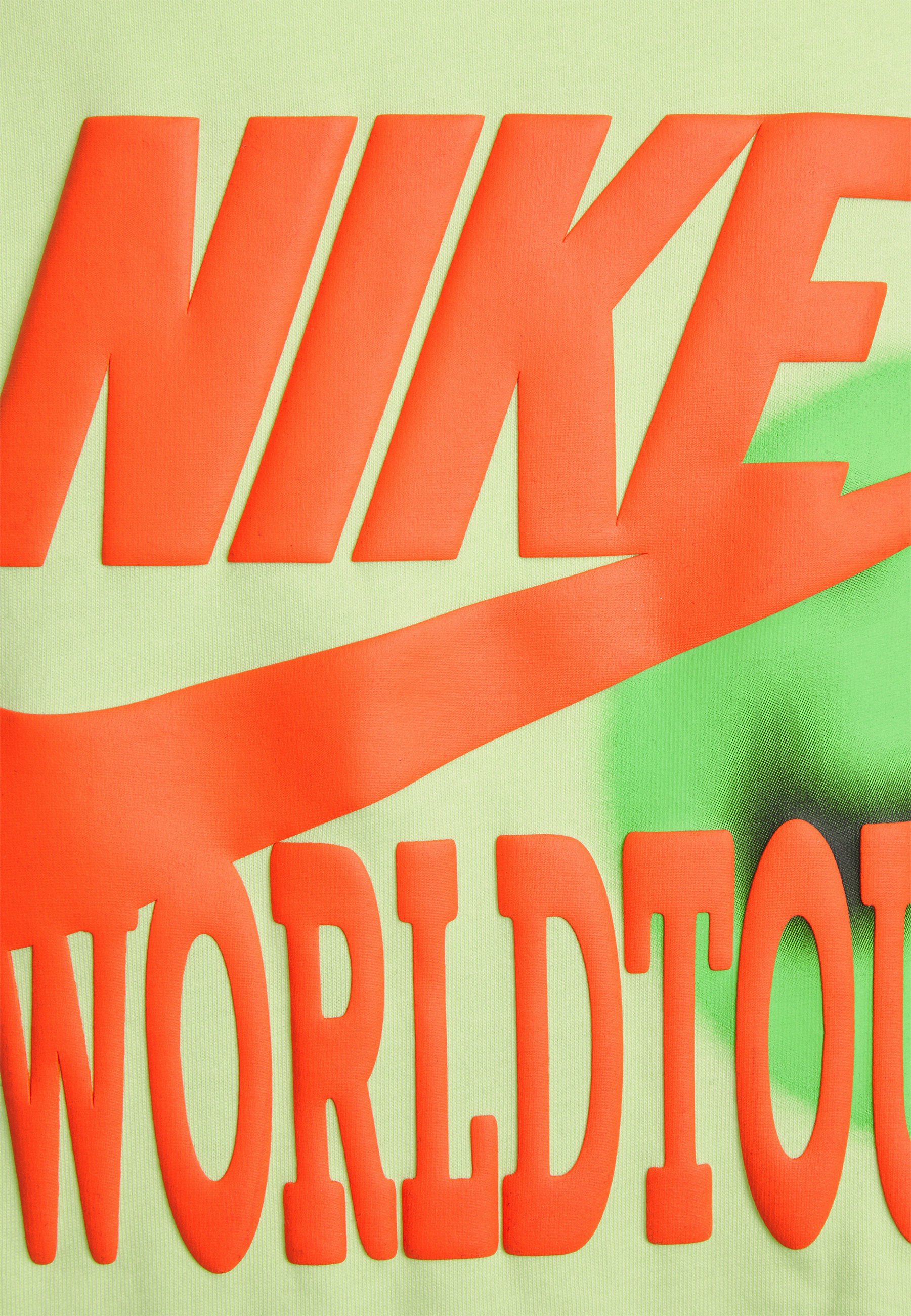 nike world tour t shirt lime