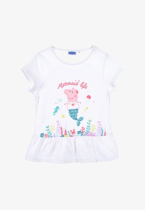 Weißes T-Shirt mit kurzen Ärmeln, das eine bunte Meerjungfrau-Grafik mit Details von Korallen und Meeresleben am Saum zeigt. Hergestellt aus weichem Baumwollmaterial, mit gerüschtem Saum.