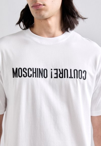 MOSCHINO T-shirt imprimé - fantasia bianco