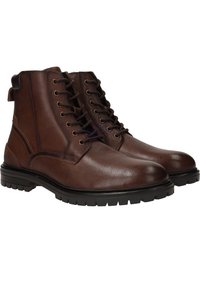 Bottes de cheville en cuir marron avec finition texturée, bout rond, fermeture à lacets à l'avant, col rembourré et semelle en caoutchouc robuste.
