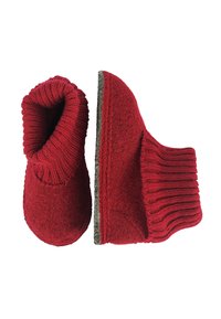 Rode wollen slippers met een gestructureerde, ribbelige bovenrand en een dikke, zachte body. Voorzien van een stevige zool voor binnengebruik.