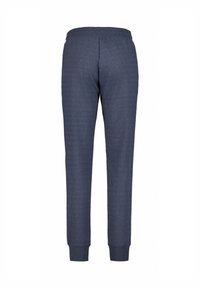 Marineblauwe sweatpants met een zachte textuur, elastische tailleband en taps toelopende benen. Boordjes bij de enkels zorgen voor een comfortabele pasvorm. Geen zichtbare patronen of accenten.