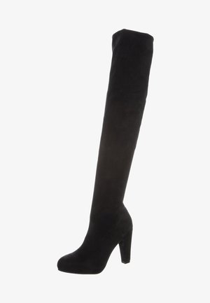 Schwarze Wildleder-Stiefel über das Knie mit einem hohen Stiletto-Absatz und runder Zehenform. Glatte Textur und figurbetontes Design für Beindeckung.