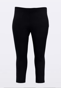 Crne helanke od rastezljivog materijala, s glatkom teksturom, uskim krojem i visokim pojasom. Bez vidljivih uzoraka ili metalnih detalja.