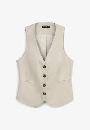 Beige maßgeschneiderter Weste mit vier dunklen Knöpfen auf der Vorderseite und zwei horizontalen Einschubtaschen, ärmellos mit einem V-Ausschnitt.