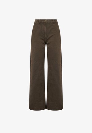 Brune højtaljede bredbenede bukser i fløjl med forreste knap- og lynlåslukning, bæltestropper og synlige sømme.