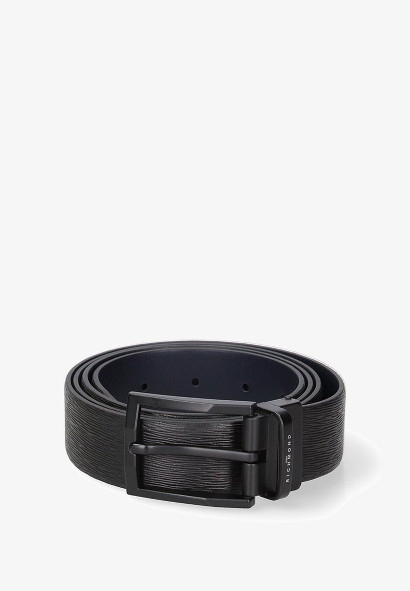 Black leather belt with a textured surface, featuring a matte black metal buckle. The belt is coiled, showing multiple adjustment holes.