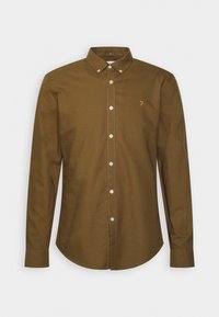 Camicia a maniche lunghe con bottoni in cotone verde oliva scuro. Presenta un colletto classico, bottoni bianchi e un piccolo logo ricamato sul petto.