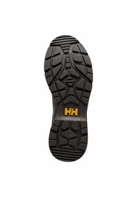 Suela de zapato de goma con un patrón de banda de rodadura resistente, que presenta profundas ranuras para tracción. Logotipo amarillo "HH" centrado cerca del área del talón.