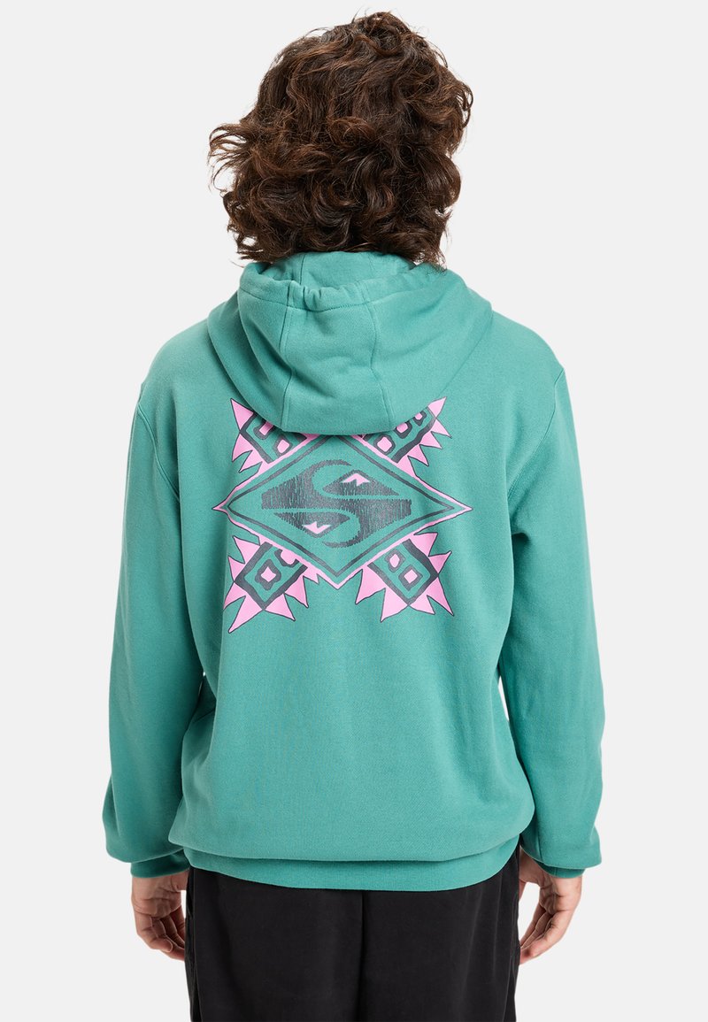 Turquoise hoodie with pink geometric pattern on the back, featuring a drawstring hood and a relaxed fit design. Soft texture.