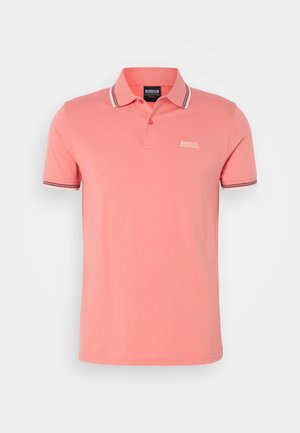 Heled roosa polo-särk, mis on valmistatud puuvillast. Omab klassikalist kraed, kolme nupuga paelat ja triibulist detaili krael ja varrukatel.