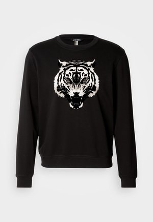 Sort sweatshirt med lange ærmer, der har et stort hvidt tigerprint på forsiden. Lavet af bomuld med et klassisk crew neck design.