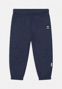 Donkerblauwe doorgestikte broek met elastische tailleband en boorden, met een klein hummel-logo patch op de rechterdij en een reflecterende streep vlak bij de boord.