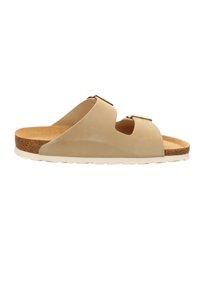 Beige slidesandal med två justerbara remmar, korkfotbädd och gummisula. Slät textur med en modern, minimalistisk design.