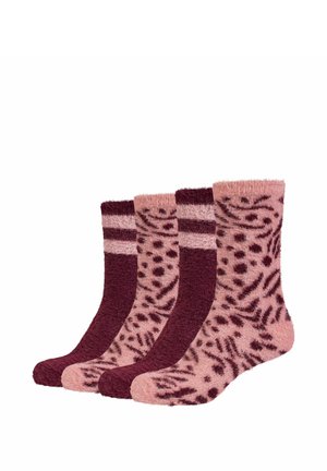 Vier Paar flauschige Socken in Pink und Burgund, abwechselnd mit einfarbigen Streifen und Tierdruckmustern, nebeneinander ausgestellt.