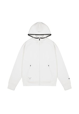 Hoodie zip blanc avec une capuche ajustée, bord noir sur le bord de la capuche, deux poches zippées et un petit logo sur la manche. Texture lisse.
