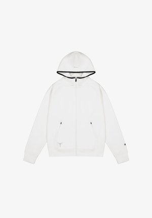 Sudadera blanca con cremallera y capucha ajustada, ribete negro en el borde de la capucha, dos bolsillos con cremallera y un pequeño logo en la manga. Textura suave.