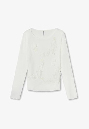 Fehér, hosszú ujjú ing, amelynek elülső részén virágos hímzés található, kerek nyakkivágással és puha anyagú textúrával. Az alja egyenes vonalú, tiszta befejezéssel.