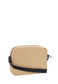 Borsa a tracolla in nylon beige con forma rettangolare, cerniera nera e tracolla regolabile. Texture liscia senza motivi o accenti visibili.