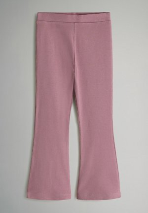 Gerippte rosa Leggings mit einem ausgestellten Saum, ausgestattet mit einem bequemen elastischen Bund und einer weichen Textur.