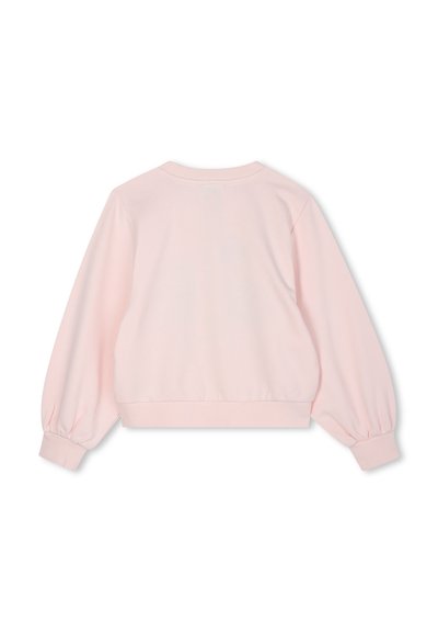 Jasnoróżowy, długi rękaw, sweter z prążkowanej tkaniny, zaokrąglony dekolt oraz elastyczne mankiety i dół. Prosty design, bez wzorów.