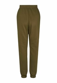 Olijfgroene joggingsbroek gemaakt van zachte stof, met een elastische tailleband en aansluitende boorden bij de enkels. Glad textuur zonder patronen.