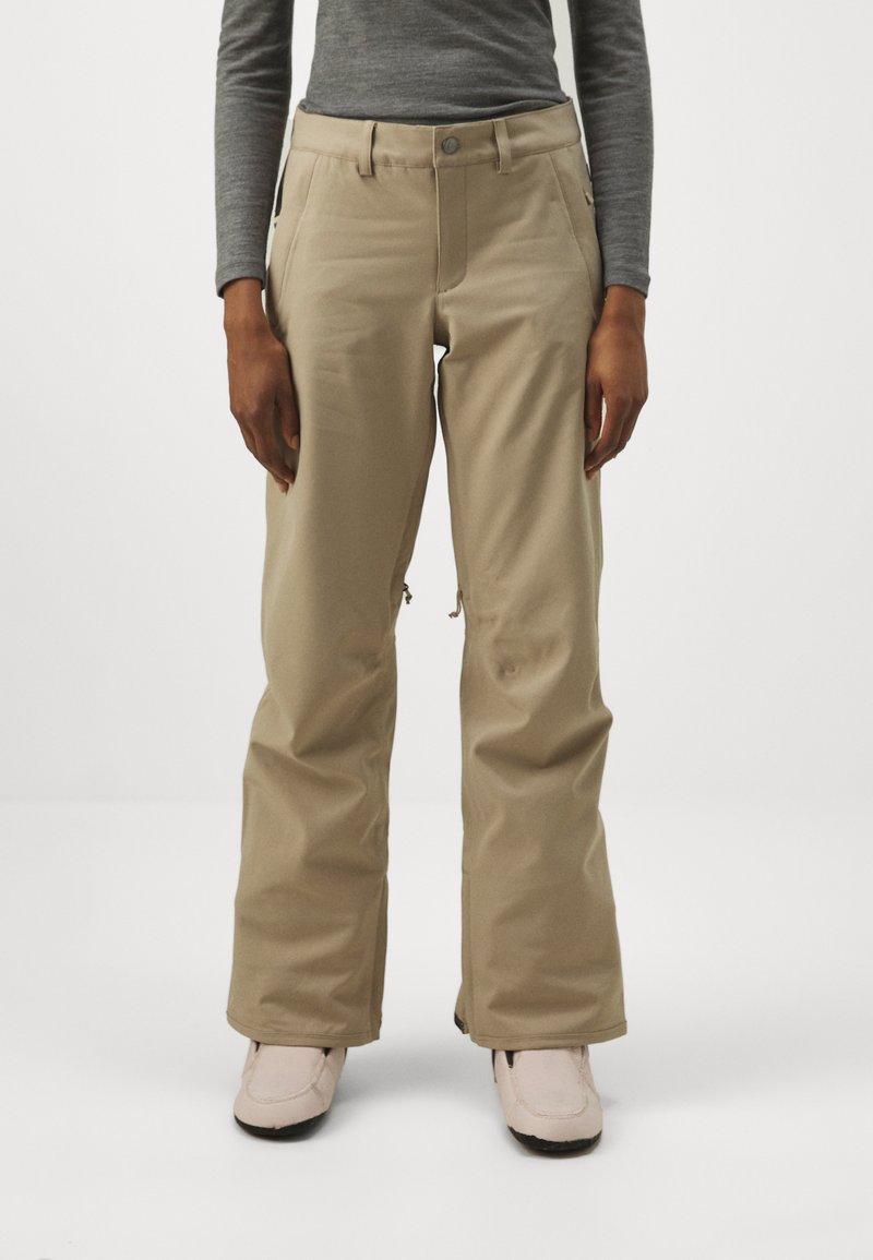 Pantalons de neige beiges avec un design à jambe droite, poches zippées et fermeture à bouton, fabriqués à partir d'un matériau durable et résistant à l'eau.
