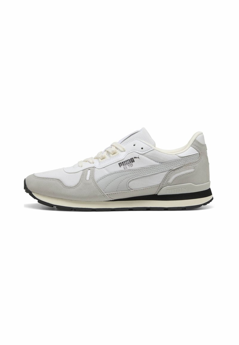 White sneaker with grey suede and mesh upper, lace-up design, padded collar, black rubber sole, and printed logo on the side.