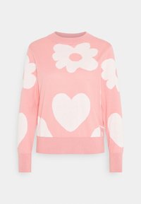 Rosa tröja med överdimensionerade vita blom- och hjärt-motiv, mjukt material, rundad halsringning samt ribbade muddar och nederkant.