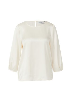 Cremefarbene Bluse aus glattem Stoff mit rundem Ausschnitt, dreiviertel Ärmeln und einem kleinen Rückenausschnitt.