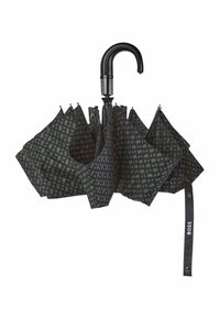 Parapluie noir avec un motif géométrique gris foncé, muni d'une poignée courbée noire et d'une sangle de marque. Le canopy est composé de plusieurs panneaux.