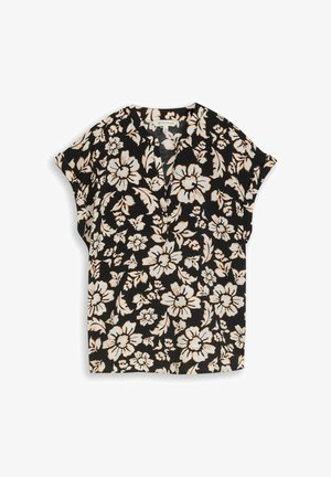 Blouse noire à manches courtes avec grand motif floral beige et blanc et petite ouverture en V.
