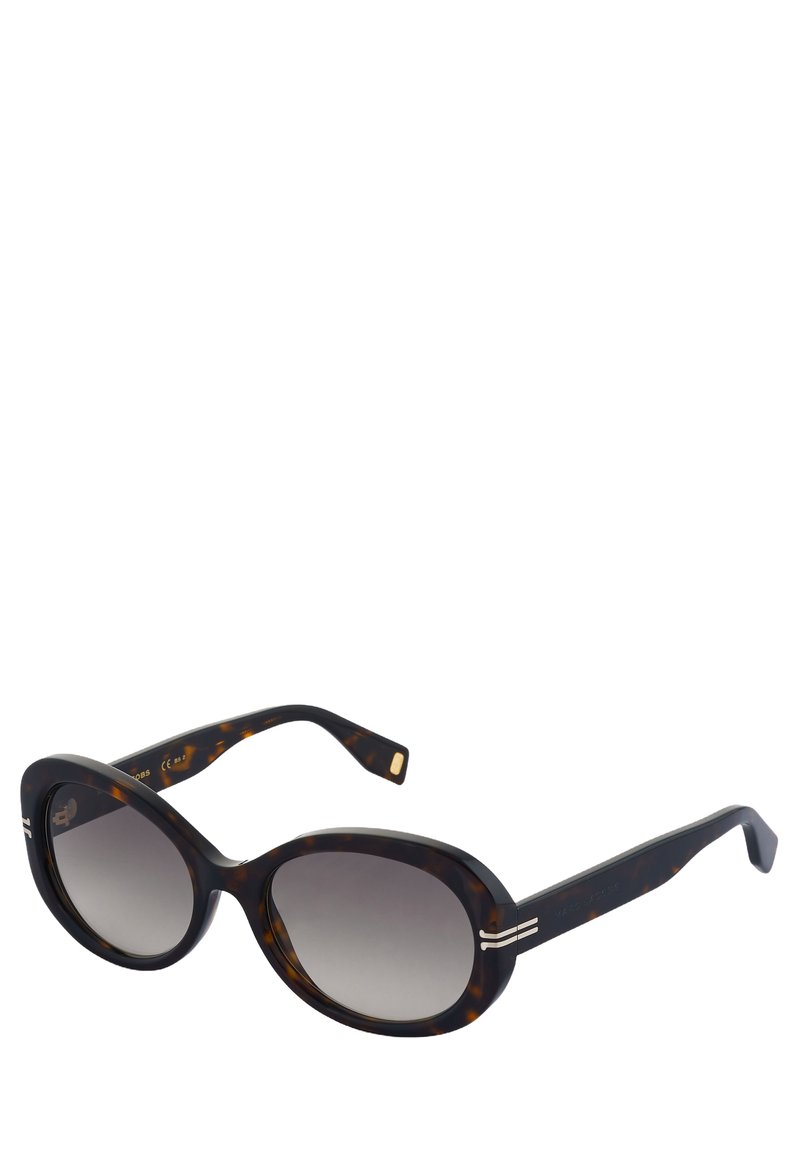 Lunettes de soleil en écaille de tortue avec une finition brillante. Monture ronde, verres dégradés gris et bandes accentuées argentées sur les tempes.