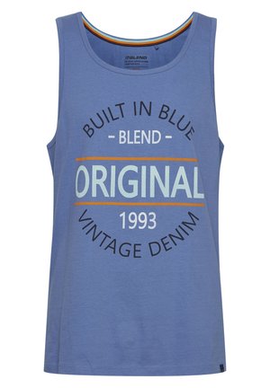 Sømløs blå tanktop laget av bomull, med sirkulær grafisk tekst: "Bygget i blått," "Original," og "Vintage denim 1993."