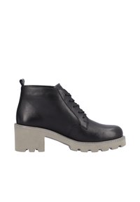 Bottine en cuir noir avec talon bloc beige épais, devant à lacets et languette à l'arrière.