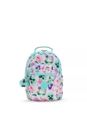 Zaino con motivo floreale in colori pastello, dotato di cerniera turchese e etichette. Tessuto morbido con un piccolo portachiavi a forma di scimmia in peluche attaccato.