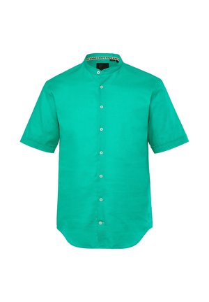 Lyhythihainen, kauluksellinen paita kirkasta vihreää kangasta, jossa on sileä pinta ja etupainike. Kauluksen ympärillä koristeellista trimmausta.