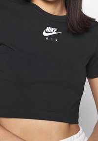 Nike Sportswear T-shirt med print - pink